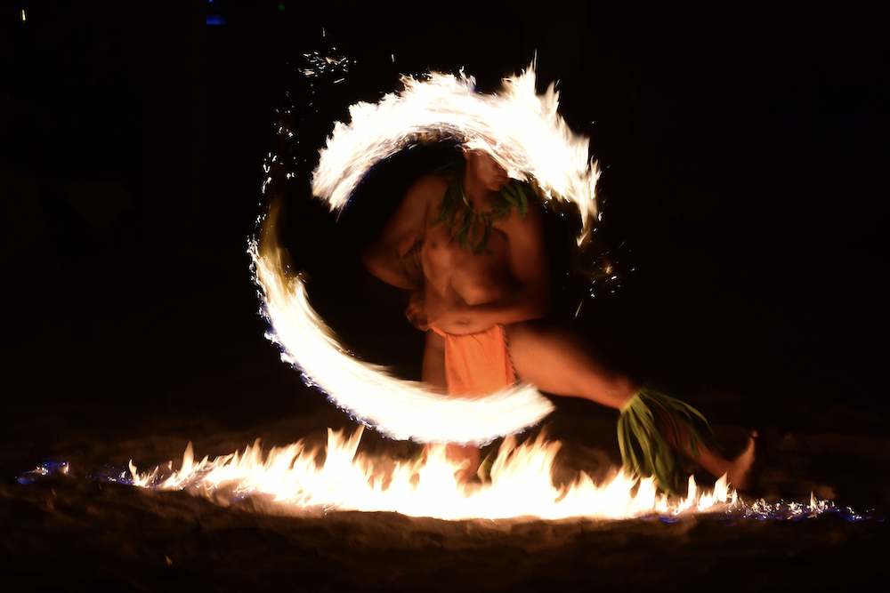 fire dancer at a luau