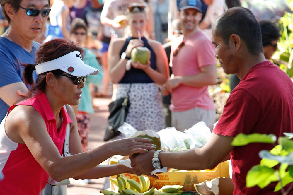 people at farmers market in Kauai