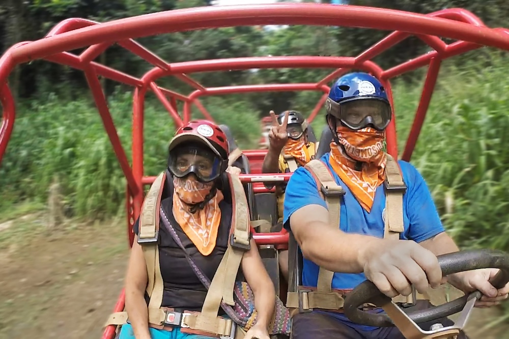 couple in an ATV in Kauai