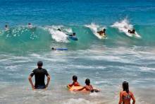 kids surfing in kauai