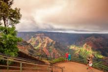 people at waimea canyon on Kauai